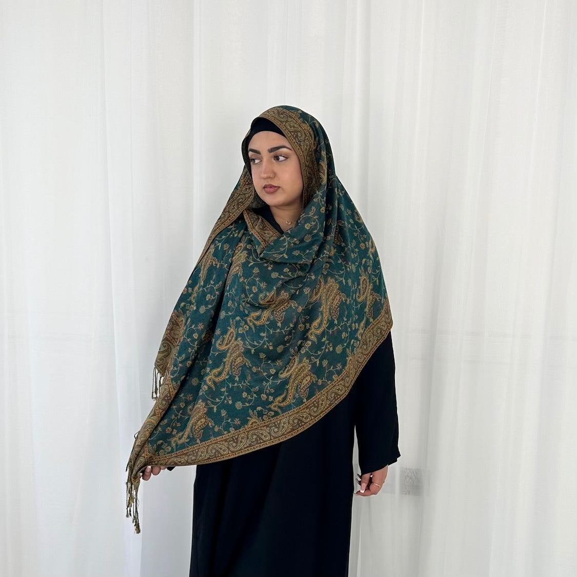 Paisley Pashmina Scarf, in Emerald. Fashionable and elegant print. Luxury Hijabs from Hana Hijabs UK.
