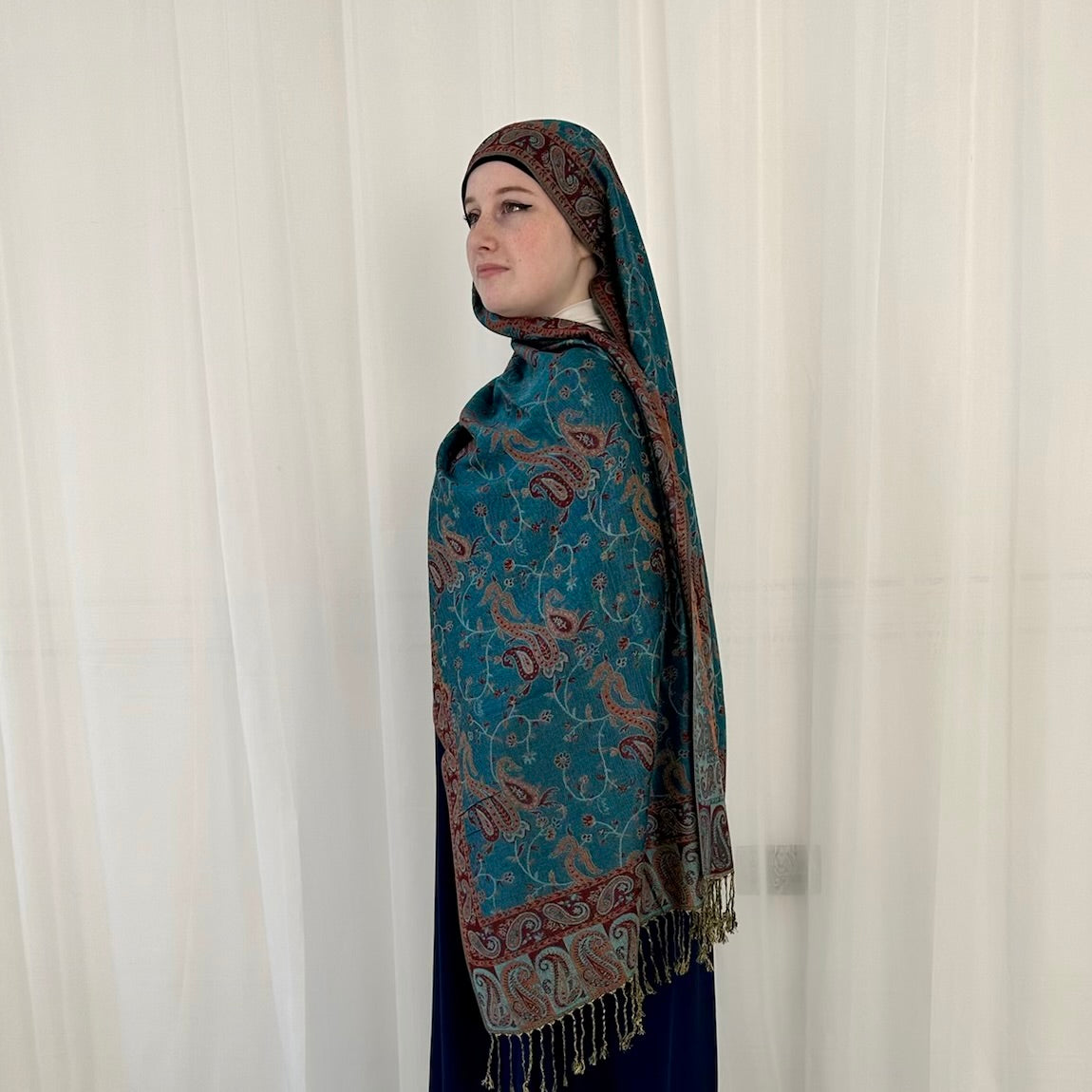 Paisley Pashmina Scarf, in Dark Cyan. Fashionable and elegant print. Luxury Hijabs from Hana Hijabs UK.