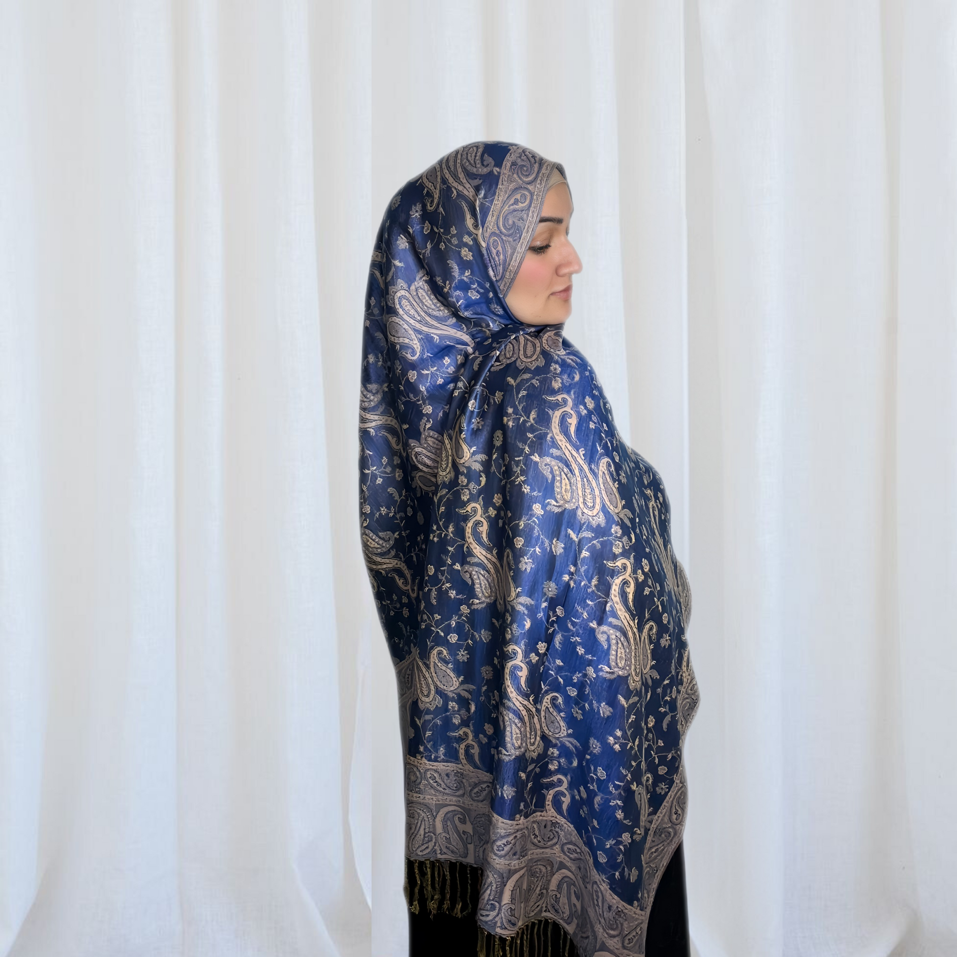 Paisley Pashmina Scarf, in blue. Fashionable and elegant print. Luxury Hijabs from Hana Hijabs UK.